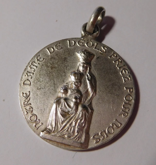 Medaille religieuse ancienne " Notre Dame de Déols " - metal argenté