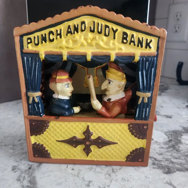 Punch and Judy cast iron bank