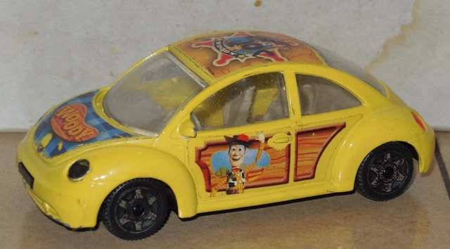 Miniature volkswagen new beetle cup BURAGO 1/43 neuve en boite Pub Kiss Cool 2 - Collection