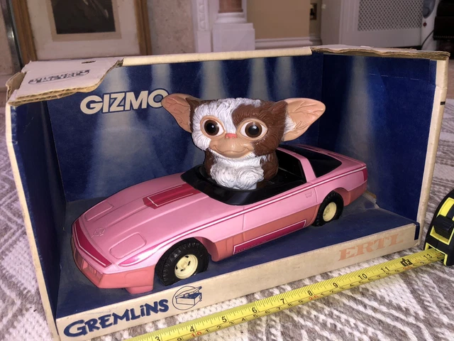 Gizmo driving barbie car top