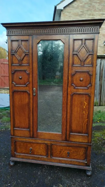 Antique hardwood wardrobe with separate drawer and mirror