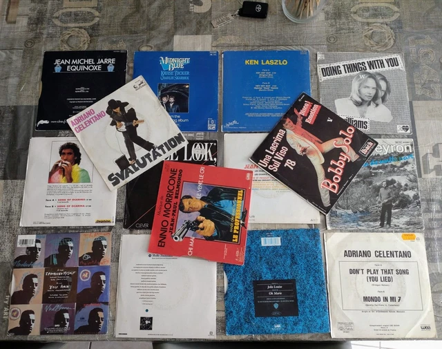 Lot de 51 vinyles 33 et 45 T divers titres voir les photos états d'occasions