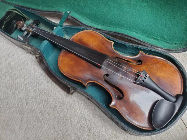 Deeply flamed, very  old  4/4 or 7/8(?) violin