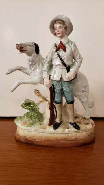Early 20th Century German Majolica Boy With Hunting Dog Figurine