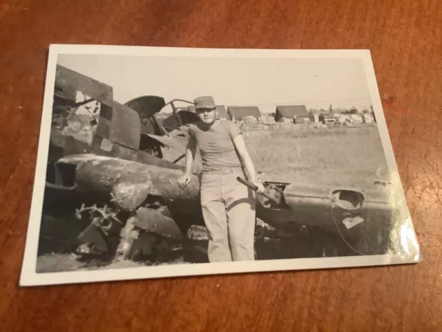 Original WWII Photo Of Marine With Shot Down Japanese Fighter Airplane
