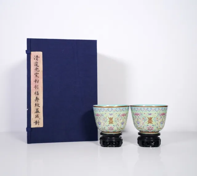 A Pair of Green Ground Famille Rose Cups with Wooden Stands and a Box