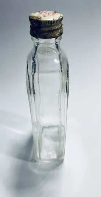 Foster-Forbes Glass Co. 1950  Medicine Clear  Bottle with cap  5.5 " tall 4.5oz 2
