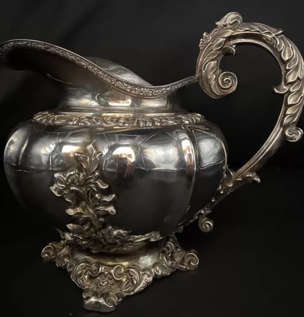 antique silver plated water pitcher