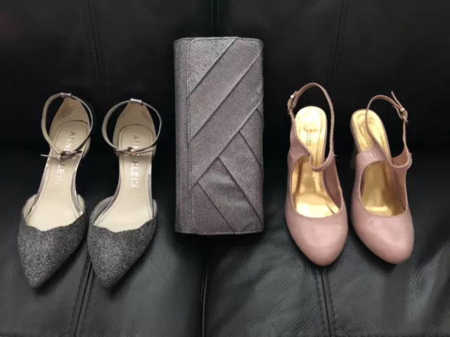 Roland cartier hotsell clutch bags