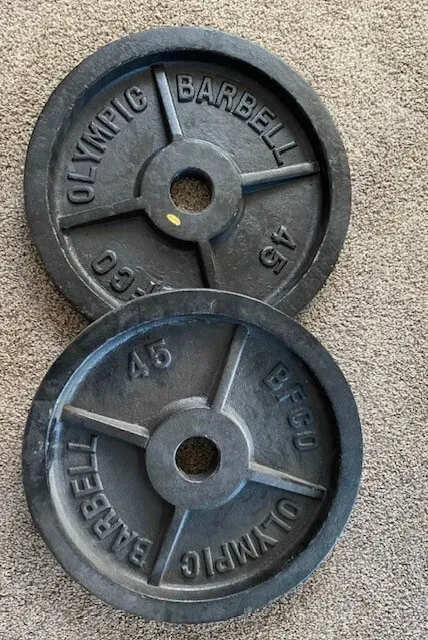 New pair rare cast-iron heavy duty hard to find 45 lb plates.BFCO OLYMPIC