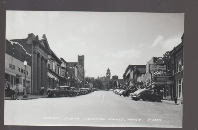 Crystal Falls MICHIGAN RPPC c1940 MAIN STREET Stores nr Iron River Mountain KB 1