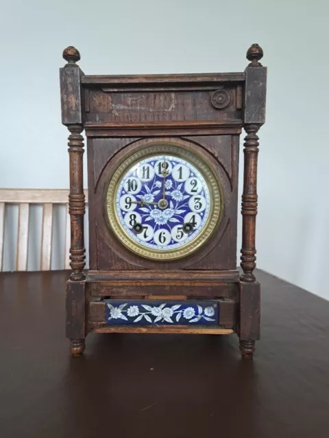 19th CENTURY FRENCH OAK CASED STRIKING MANTEL CLOCK WITH BLUE & WHITE PORCELAIN