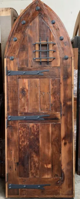 Rustic reclaimed lumber arched top Tudor DOOR speakeasy wrought iron hardware