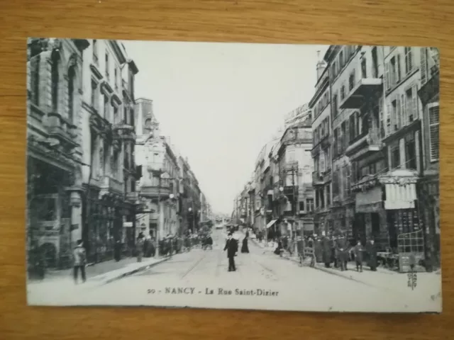 395 CPA circa 1920 - NANCY - RUE SAINT DIZIER - Très animée commerces