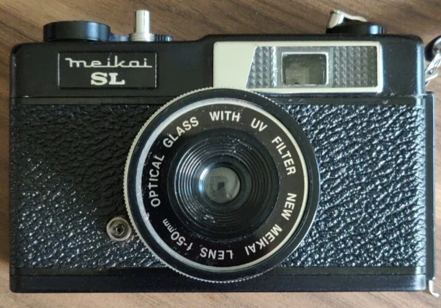 Meikai sl con lente de filtro UV de 50 mm y bolsa sin probar