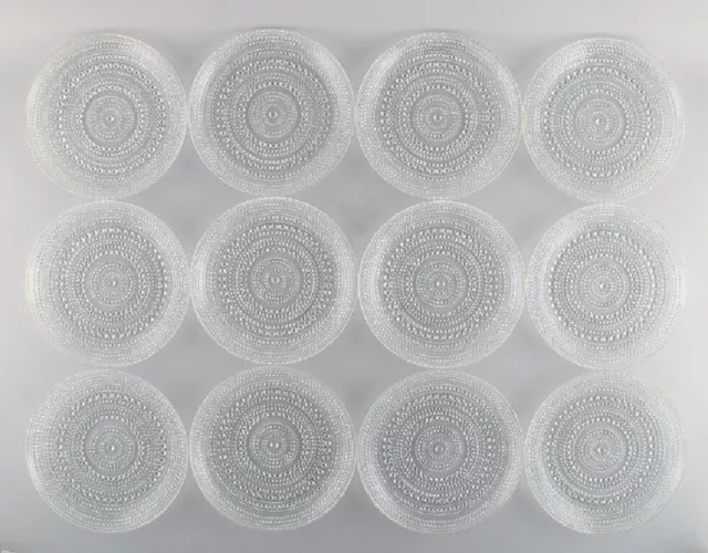 Oiva Toikka for Arabia. Twelve Kastehelmi plates in clear art glass.