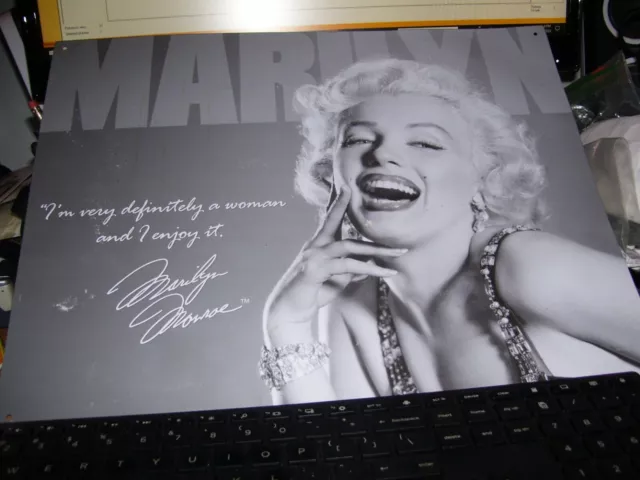 Metal [Tin ?] sign Marilyn Monroe enjoys being a woman [official hologram TM]