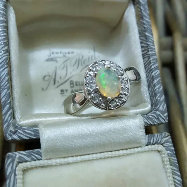 925 Sterlingsilber Ring, natürlicher äthiopischer Opal und Topas Halo, Größe S US 9