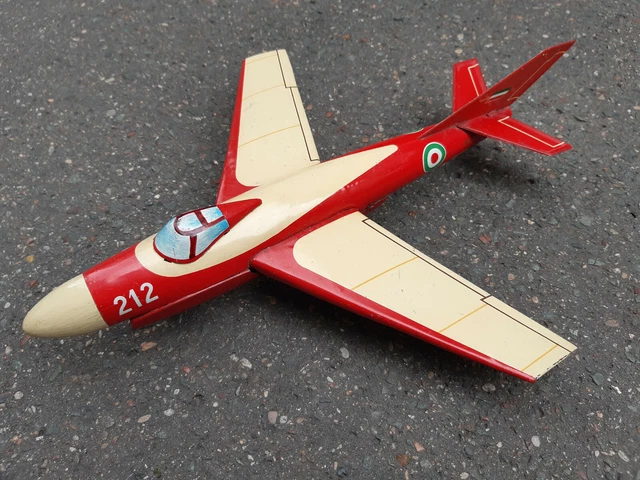 M.L, Avion mécanique en tôle lithographiée bleu argenté ... - 79870579