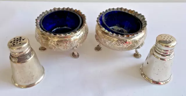 Pair of vintage hallmarked sterling silver salts and pepper shakers