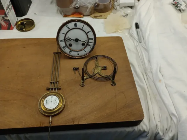 Vienna Wall Clock Movement, bracket With Gong And Pendulum.