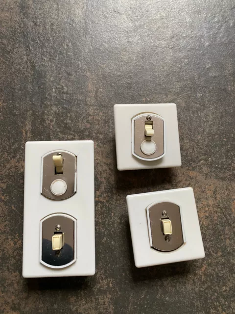 Interrupteur de luxe : 4 boutons-poussoirs dorés