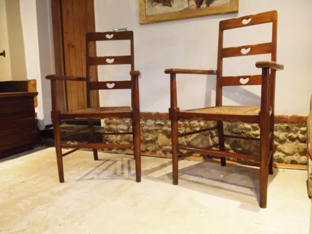 Chairs outstanding pair Arts & Crafts Oak manner of Voysey c1900