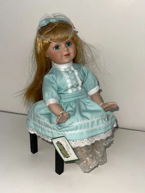 Collections Etc Sitting Pretty Porcelain 11" Doll w/ BLue Dress & Ribbon & Bench