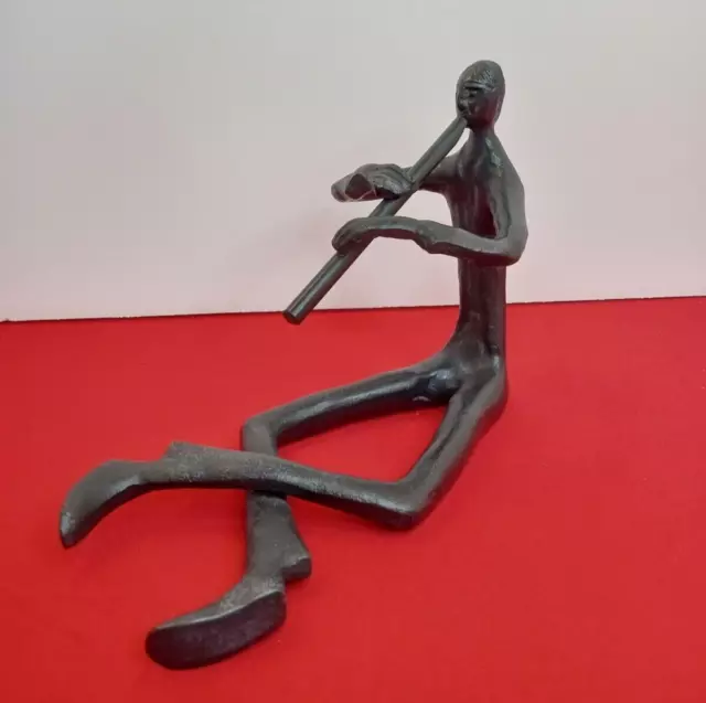 Cast Iron Figurine Minimalist Man Playing Flute Seated  Sculpture 5" Tall