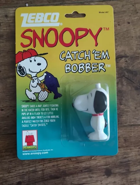 1999 Zebco brand Snoopy Peanuts CATCH’EM BOBBER Model 497 NIP