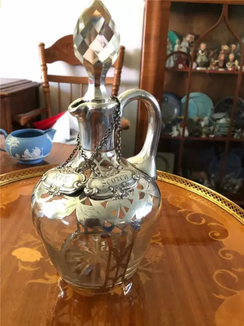 Fabulous Silver overlay Liquor decanter and two Sterling Silver decanter tags