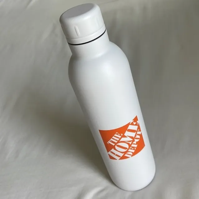 Thor white copper vacuum insulated 17oz bottle with Home Depot logos - 10"x2.5"