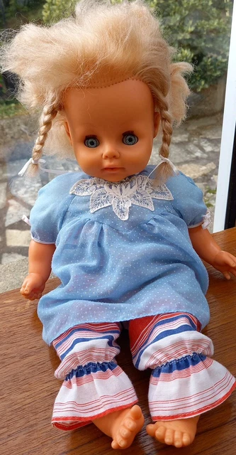 Poupée RAYNAL tout en celluloïd , yeux riboulants et dormeur