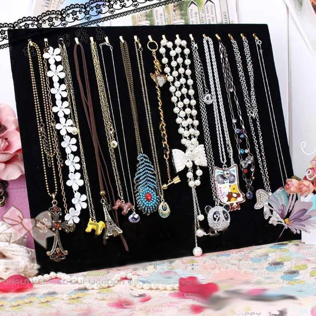 Necklace stand store with hooks