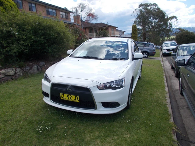 Mitsubishi 2013. Mitsubishi Lancer.sedan..es 20 Fl.. White.. 4 Speed Manual..ono