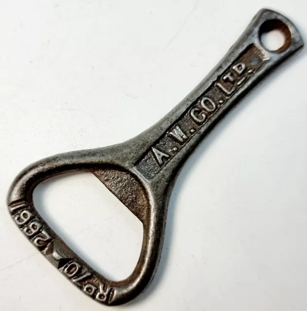 Vintage Antique Original Cast Iron Direct Supply Keyring Bottle Cork Opener 3"