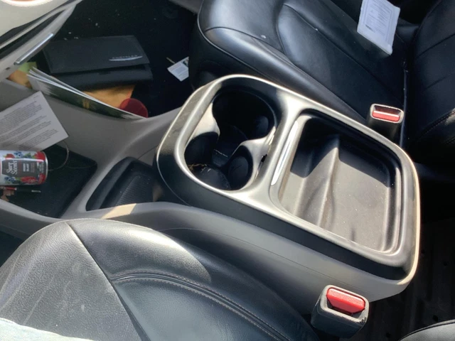 Used Front Lower Center Console fits  2017 Chrysler Pacifica floor w o retractab