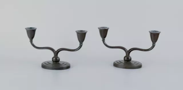 Just Andersen, pair of two-armed Art Deco candlesticks in "disko" metal.