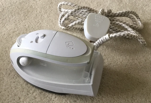 Design Go Ltd. Steam Travel Iron To Go, In Good Working Condition.