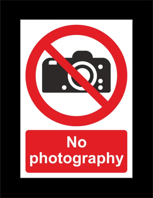 NO PHOTOGRAPHY prohibition sign or sticker security illegal public place camera