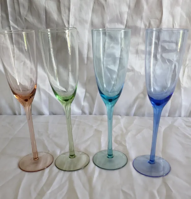 https://www.picclickimg.com/SiQAAOSwj91lk4HZ/Set-Of-4-Harlequin-Champagne-Glasses-One-Small.webp