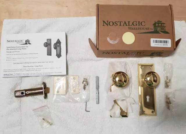 Nostalgic Warehouse Polished Brass Door Knob Set with Privacy Pin Open Box