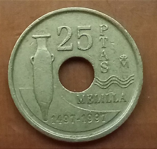 Moneda de 25 pesetas, Melilla, año 1997, con agujero central