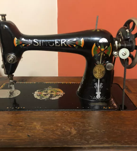 Vintage Singer Treadle Sewing Machine  with cast iron base.