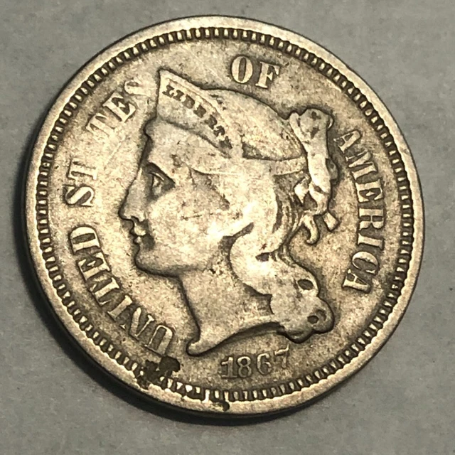 1867 nickel three cent piece, Fine/VF 3c. Small planchet flaws. #nd5