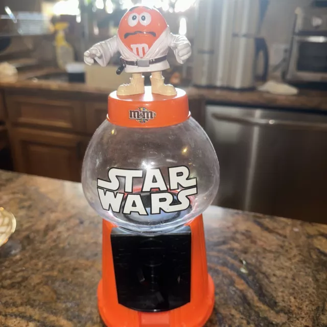 https://www.picclickimg.com/SosAAOSwOt1lPT4B/Star-Wars-MM-Candy-Gumball-Dispenser-Luke-Skywalker-Orange.webp