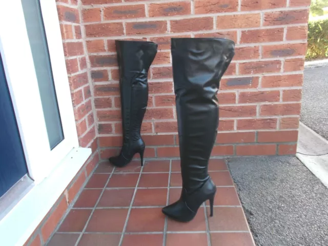 Black pvc top thigh high boots