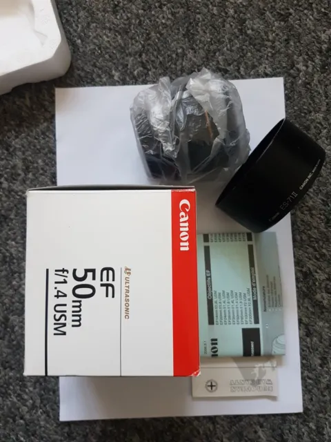 Canon EF 50mm f/1.4 USM + Box + Original Canon Haube + UV Filter +TOP