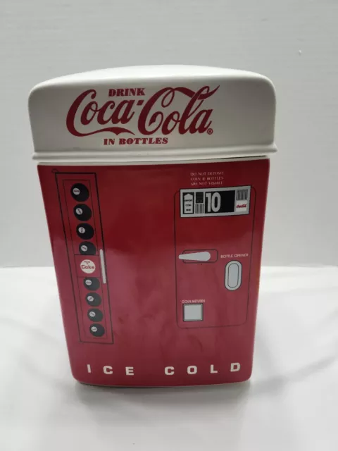 Used coca cola machine cookie jar