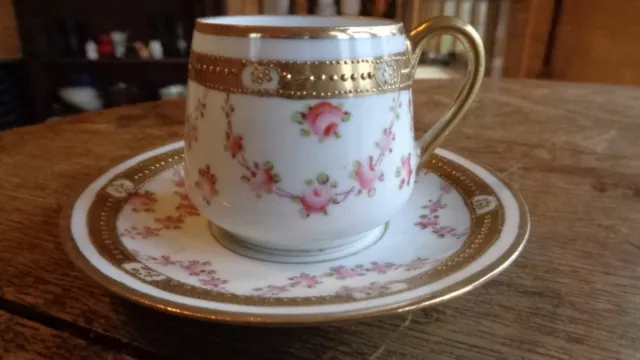 Chikusa Nippon hand painted porcelain cup and saucer